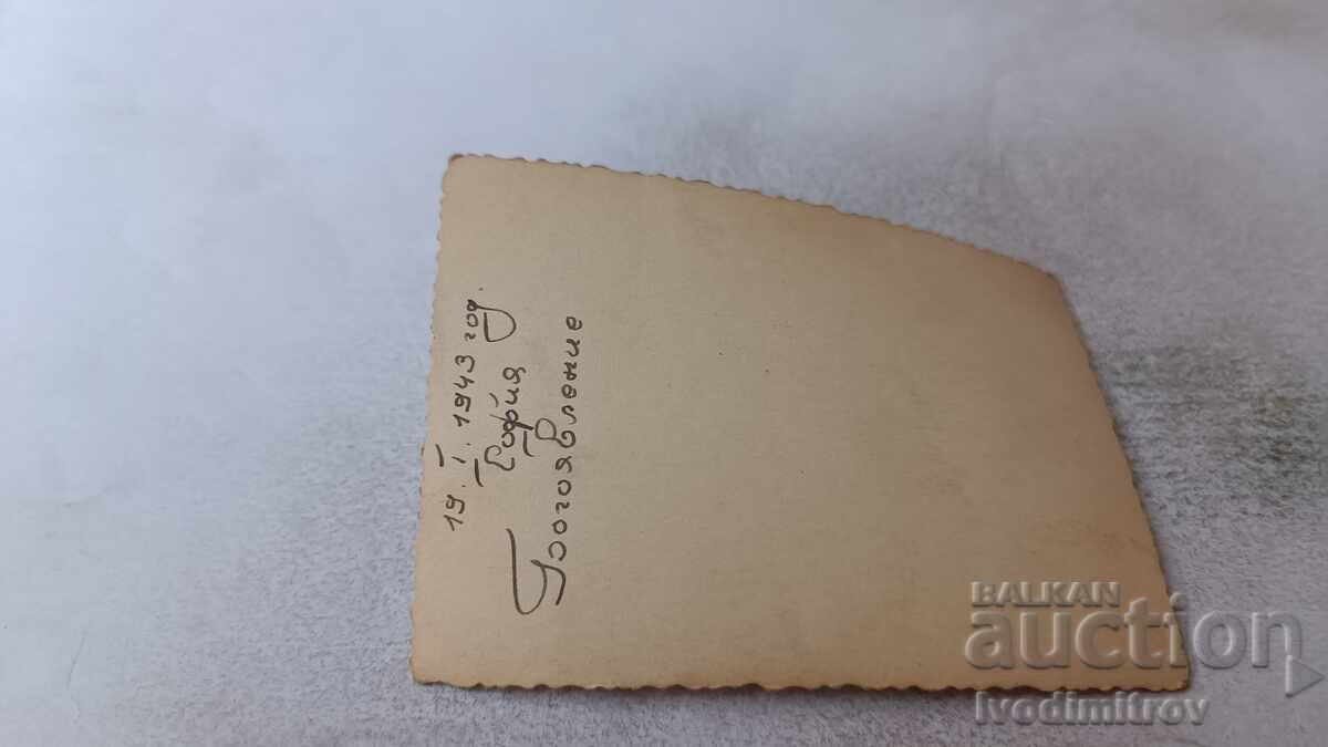 Photograph Sofia Officer and Young Girl by Wooden Fence 1943 with price 1.85 BGN | € 0.95