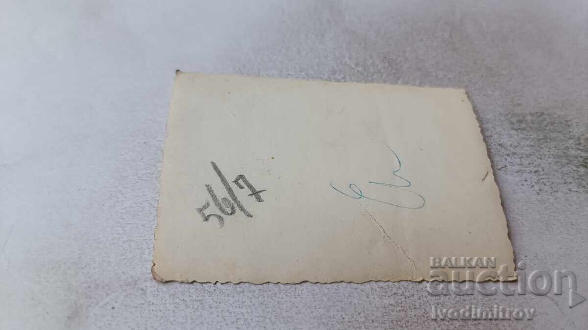 Photo Sofia Four young people on the sidewalk with price 2.15 BGN | € 1.10