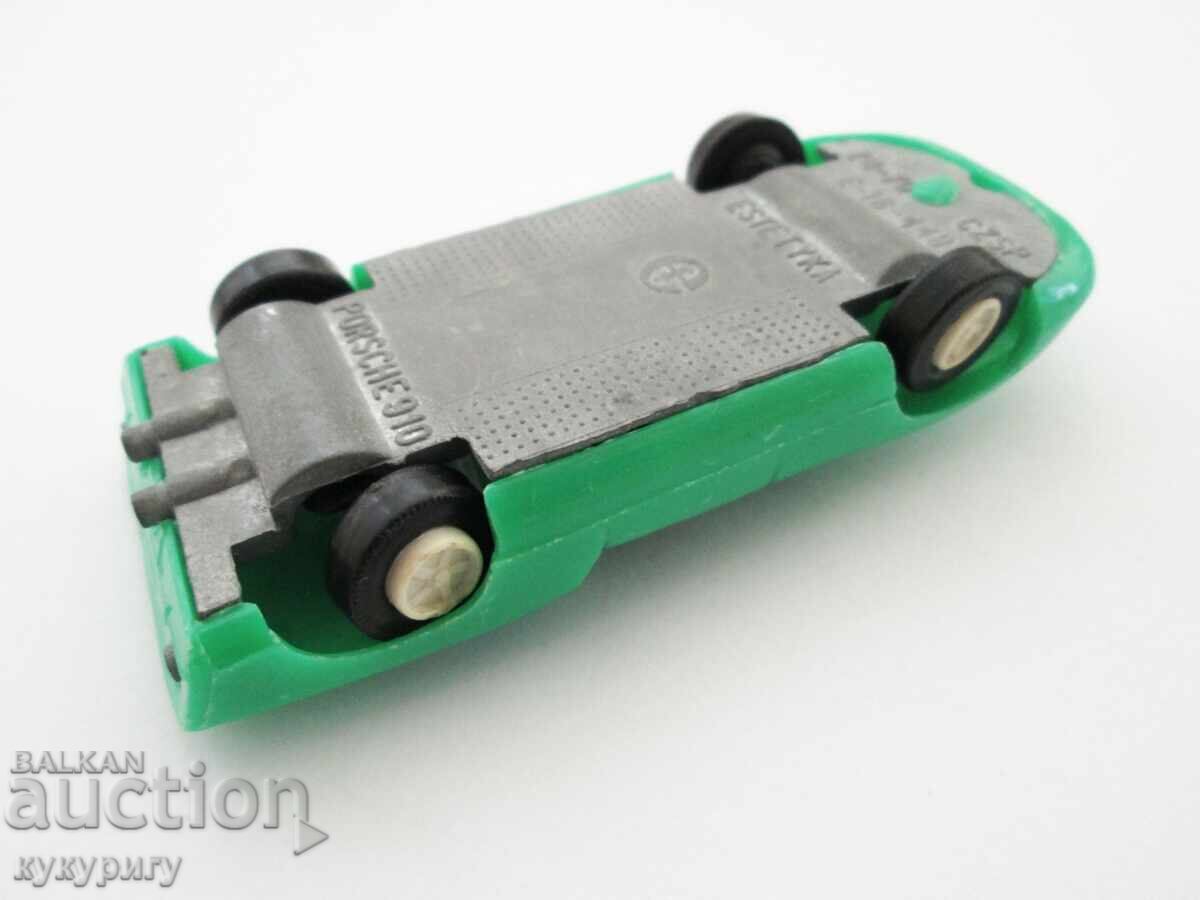 Delivery of Old children's toy car Porsche 910 Aesthetics Porsche