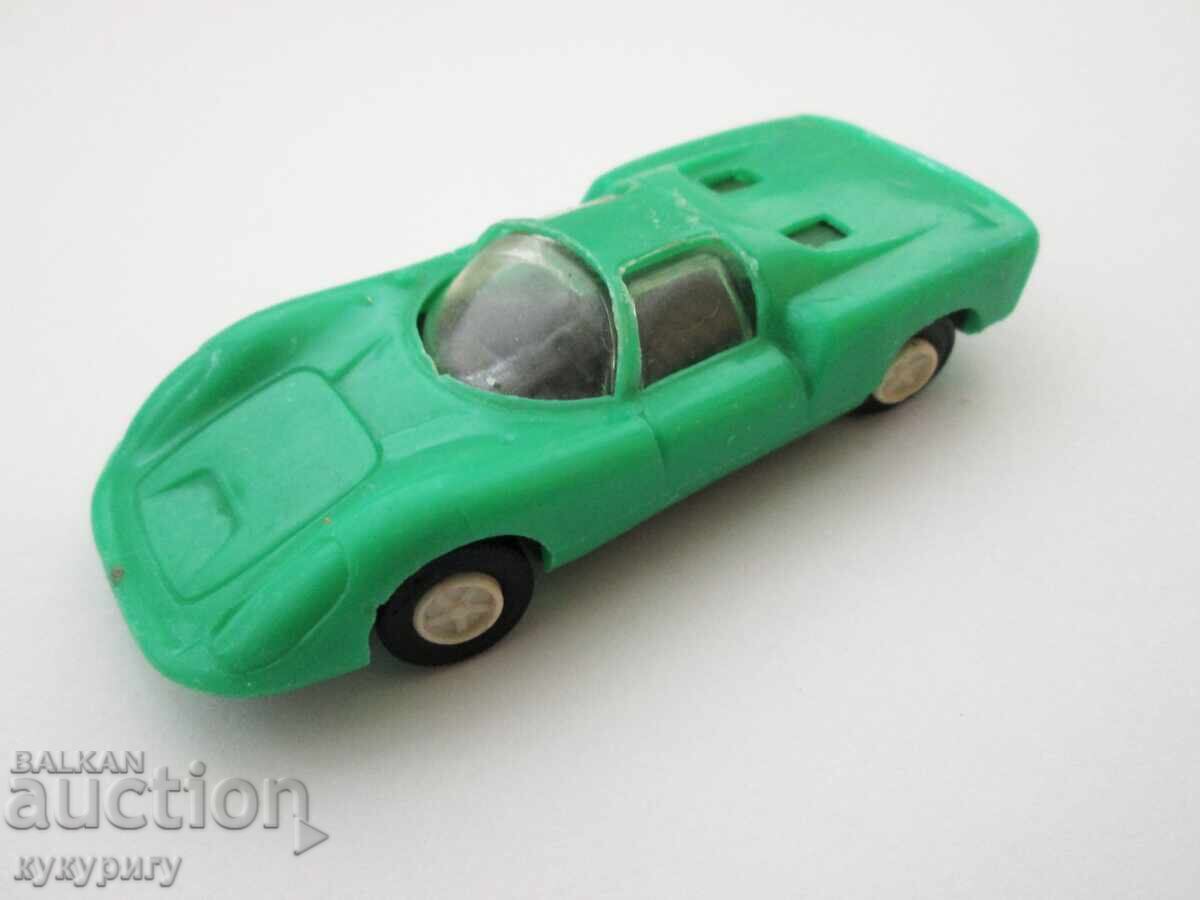 Old children's toy car Porsche 910 Aesthetics Porsche