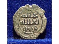 Monedă de cupru falsă a califatului Omayyad