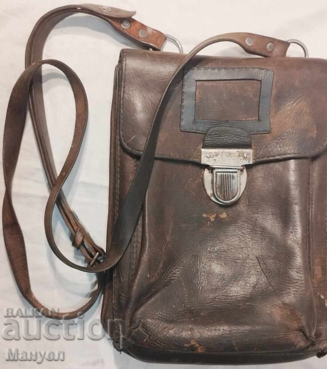 Old commander's leather bag, tablet, early social