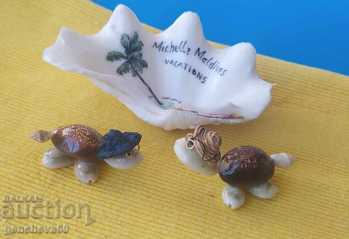 Φιγούρες από κοχύλια και σταχτοδοχείο