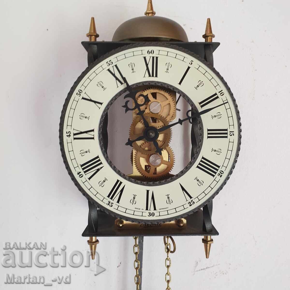 Auction  Hermle wall clock, weight-driven, wrought iron