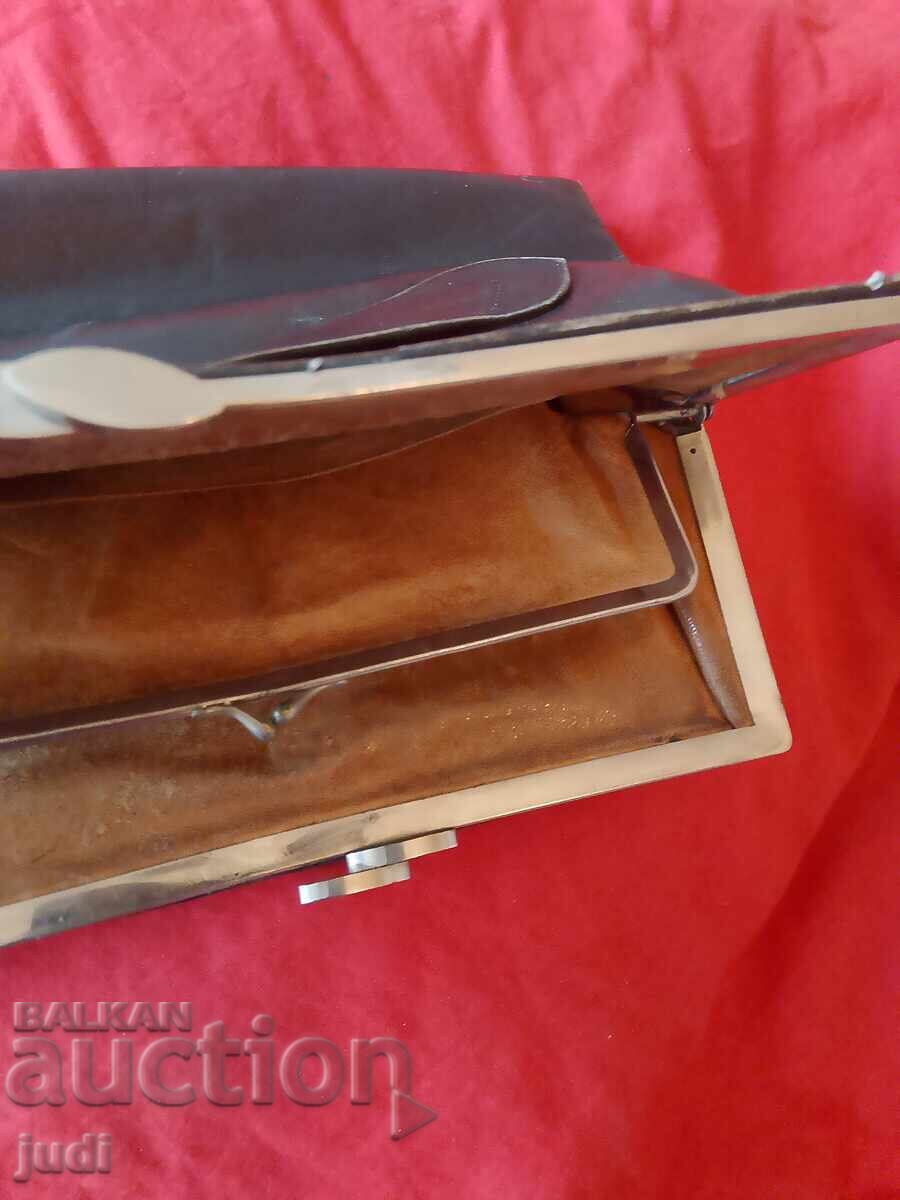 Old natural leather bag with metal hardware with price 30.00 BGN | € 15.34 Old natural leather bag with metal hardware with price 30.00 BGN | € 15.34