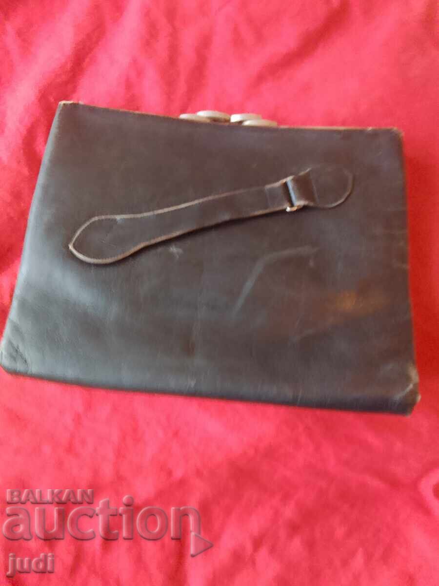 Old natural leather bag with metal hardware Old natural leather bag with metal hardware