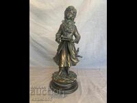 Figure statuette of a student