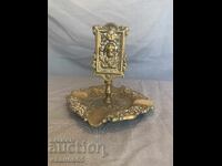 Brass ashtray with matchbox holder with decoration