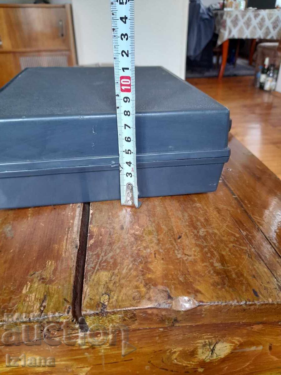 Delivery of Old plastic suitcase Delivery of Old plastic suitcase