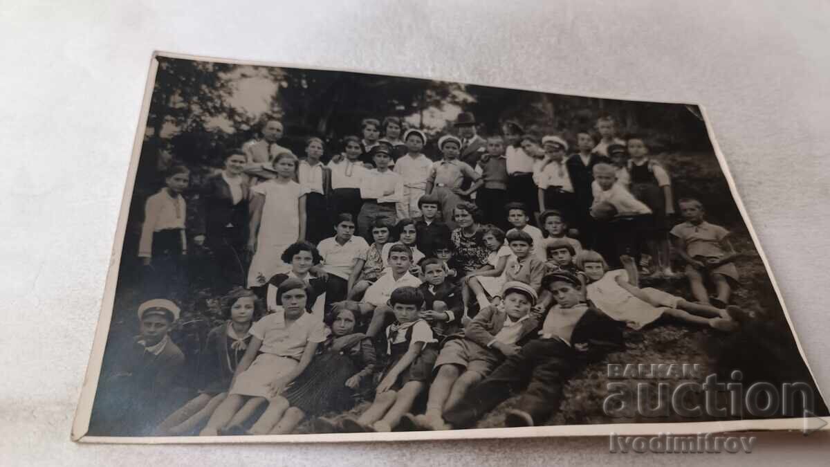 Fotografie Bărbați femei și copii Fotografie Bărbați femei și copii