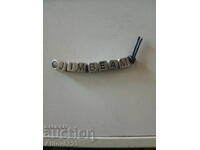 Capac de reclamă pentru whisky "Jim Beam"