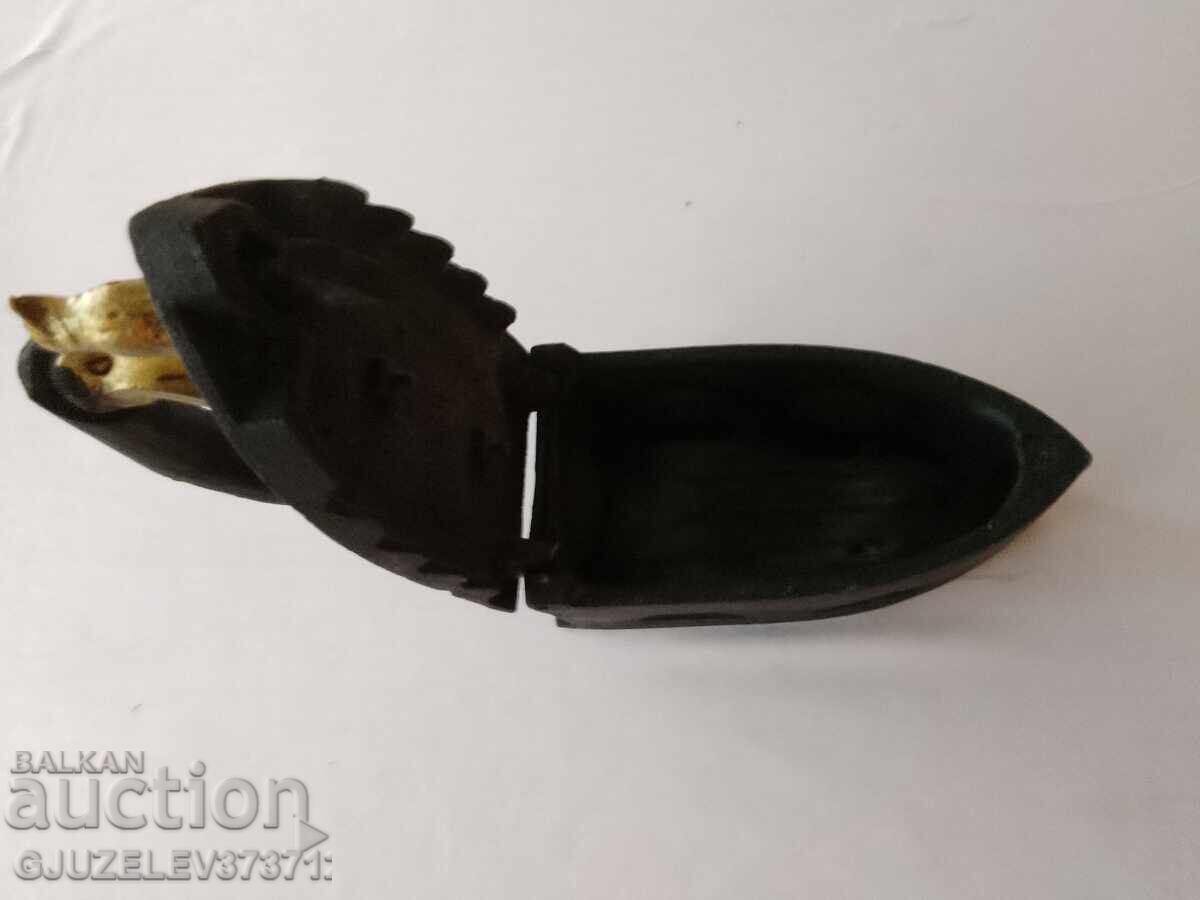 Delivery of An old cast iron iron on fire