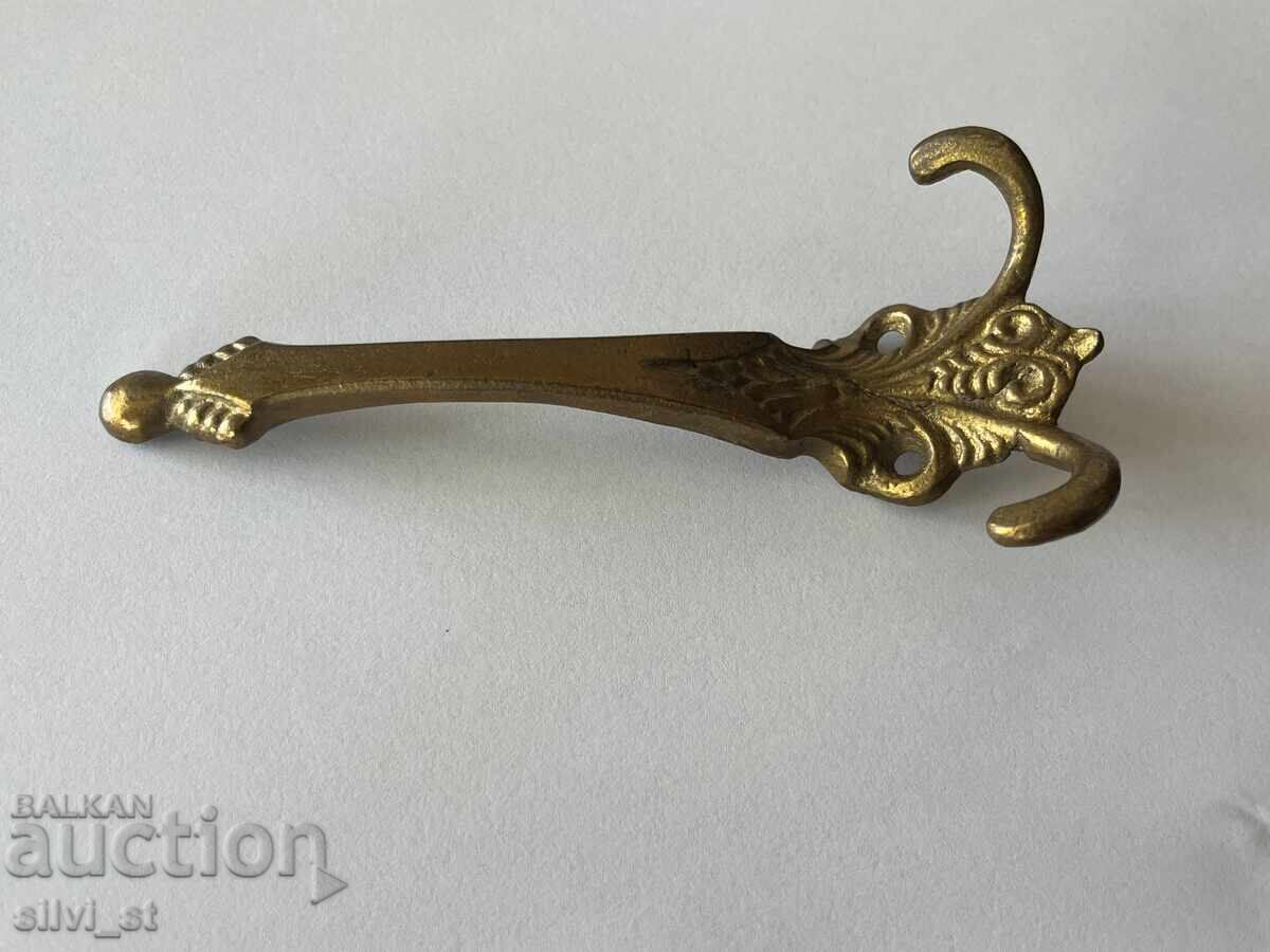 Auction Brass wall hanger Auction Brass wall hanger