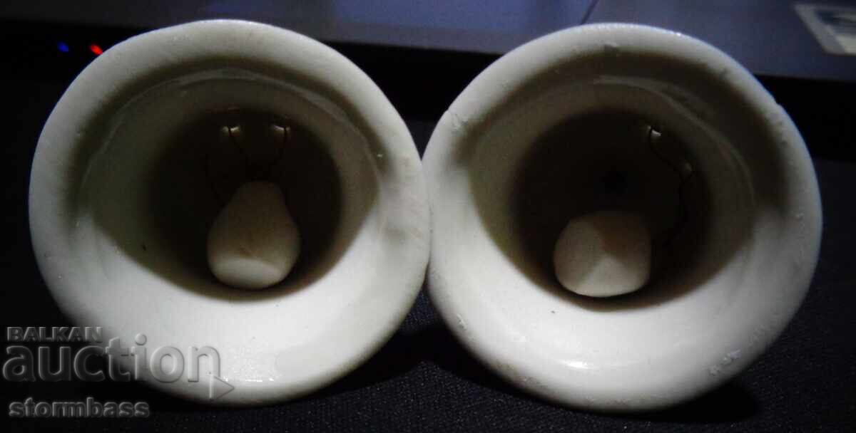 Auction  Lot of two porcelain bells