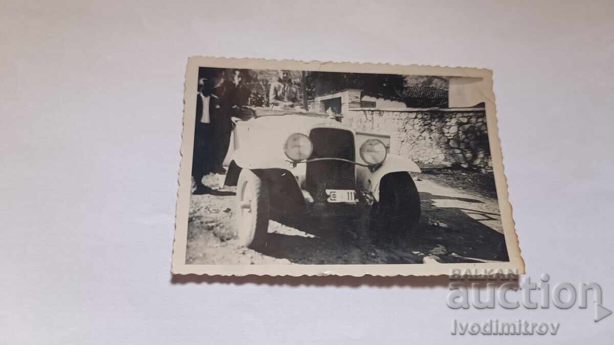 Sofia, Two men, a young woman with a retro car. Reg. No. 111 Sofia, Two men, a young woman with a retro car. Reg. No. 111