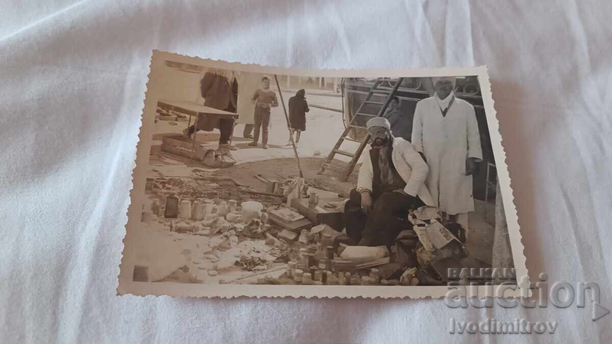 Photo of Two Men at a Market Photo of Two Men at a Market