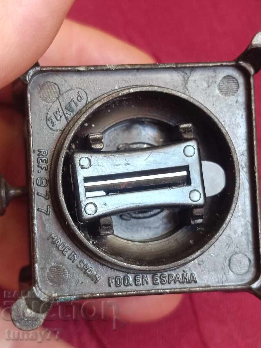 Auction  Rare metal pencil sharpener with markings
