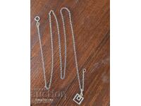Silver chain with pendant. 49cm. I'm listing over 100 auctions