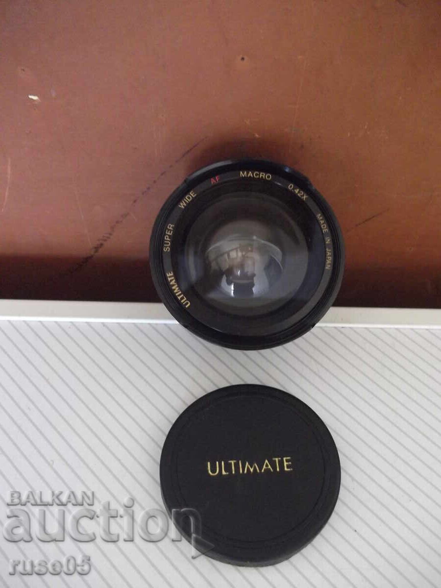 Livrarea Obiectiv "ULTIMATE SUPER WIDE AF MACRO 0.42X" unghi larg Livrarea Obiectiv "ULTIMATE SUPER WIDE AF MACRO 0.42X" unghi larg