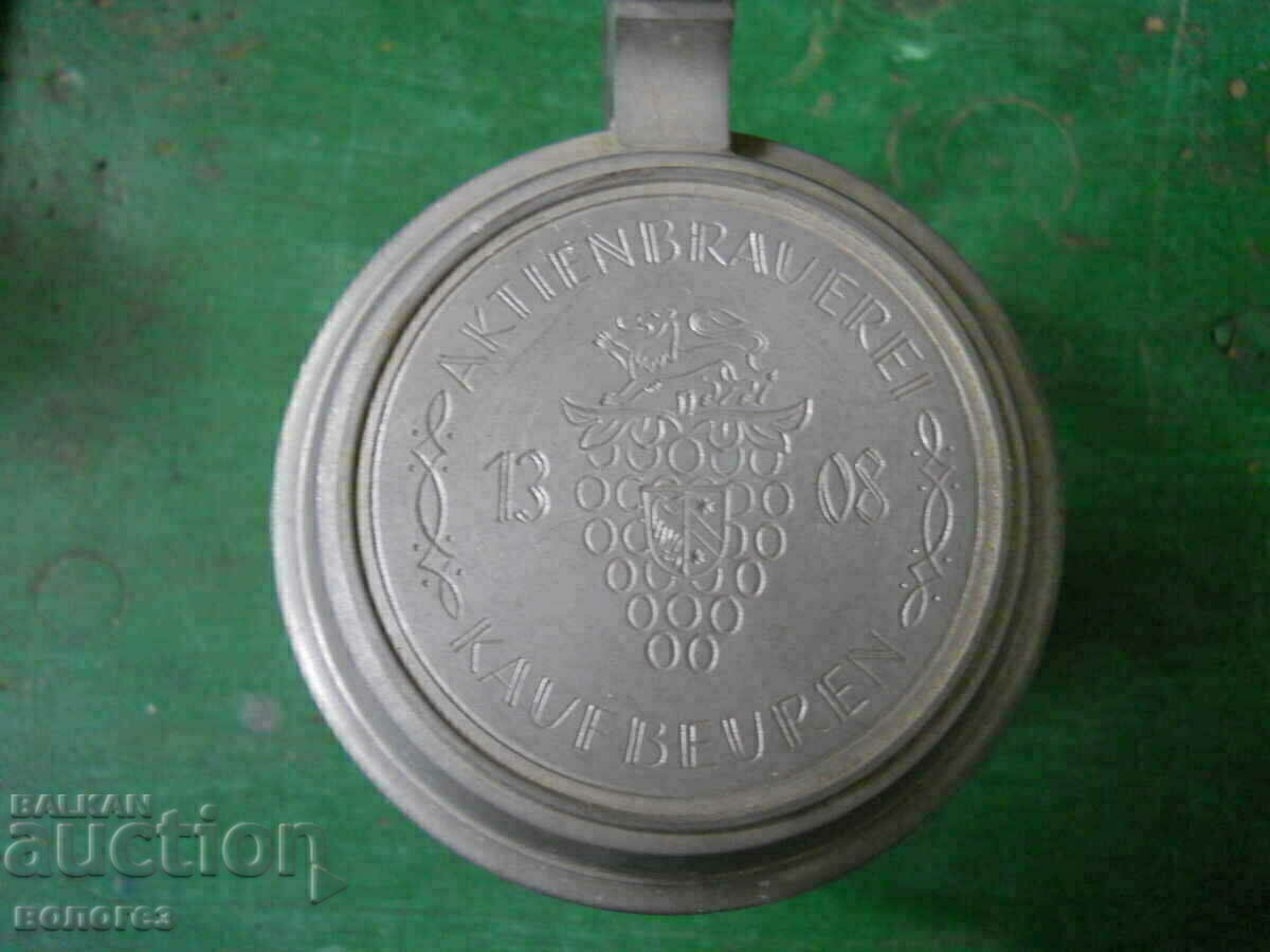 Livrarea Cana de bere metalica cu capac - Germania Livrarea Cana de bere metalica cu capac - Germania