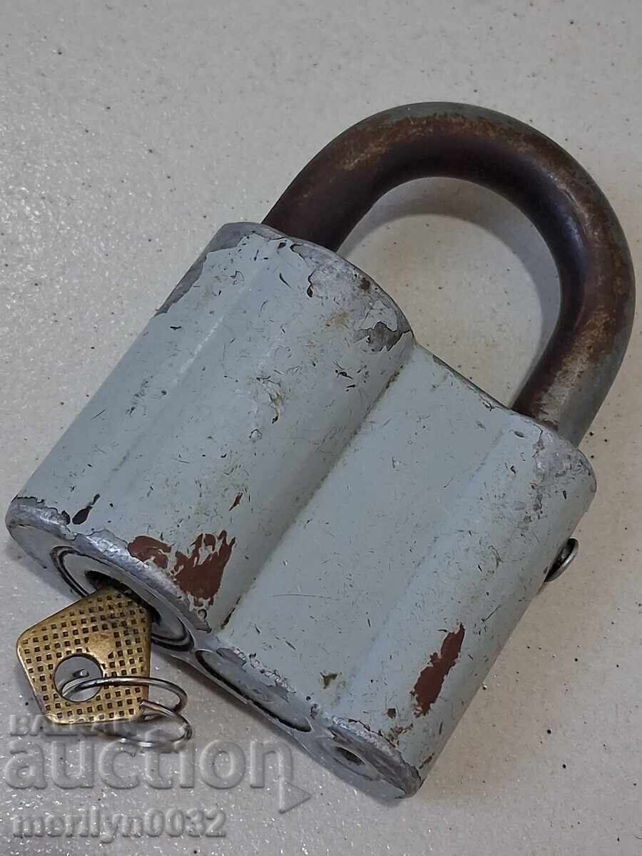 Old Russian padlock with key USSR padlock, latch, suitcase