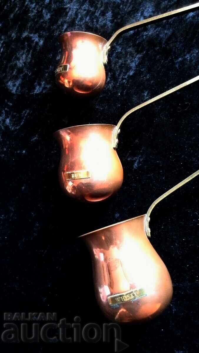 Delivery of 3 vintage copper + brass spirit heaters