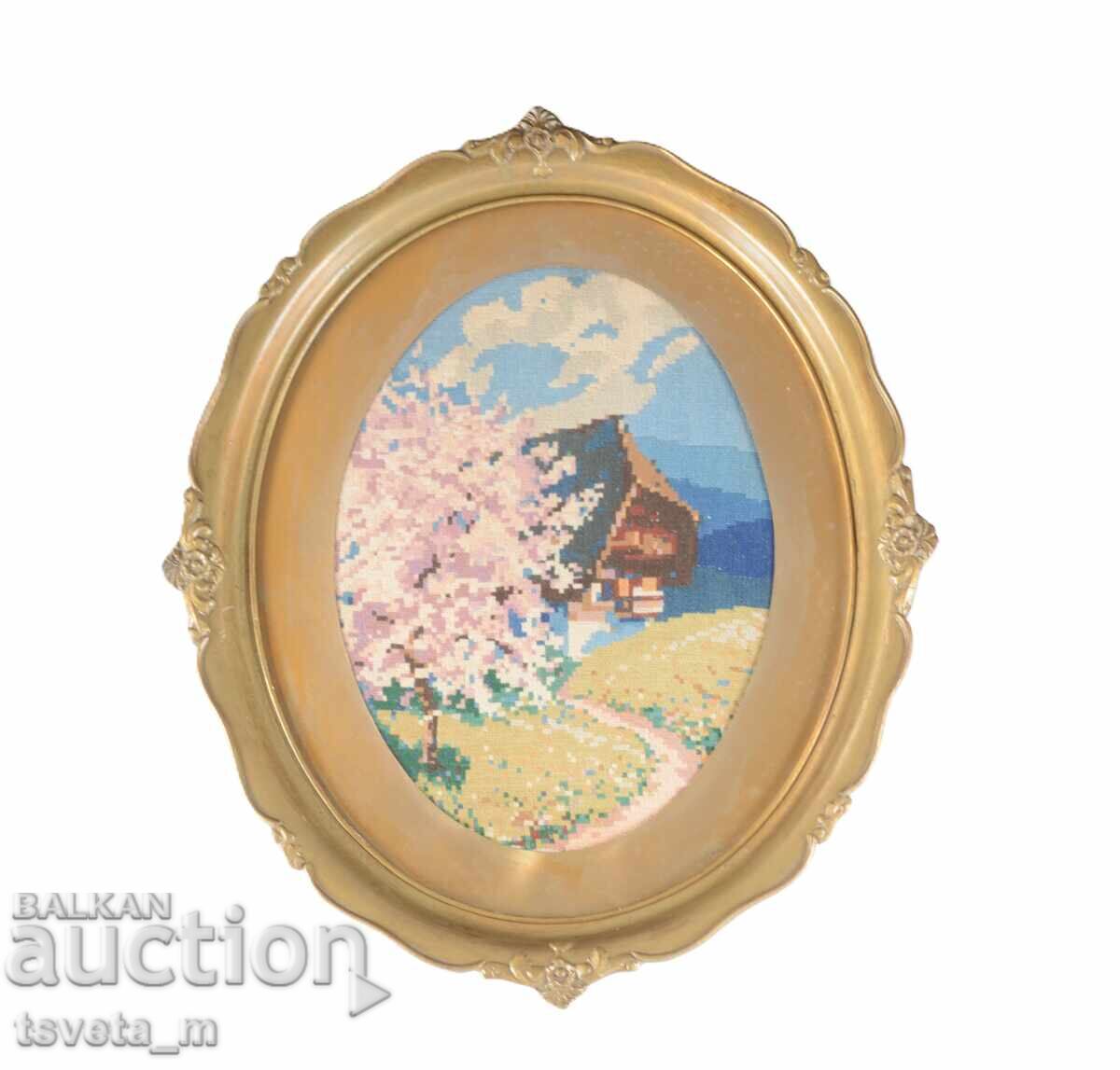 Oval gold frame with tapestry spring landscape Oval gold frame with tapestry spring landscape