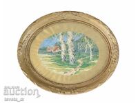 Oval gold frame with tapestry house with tree