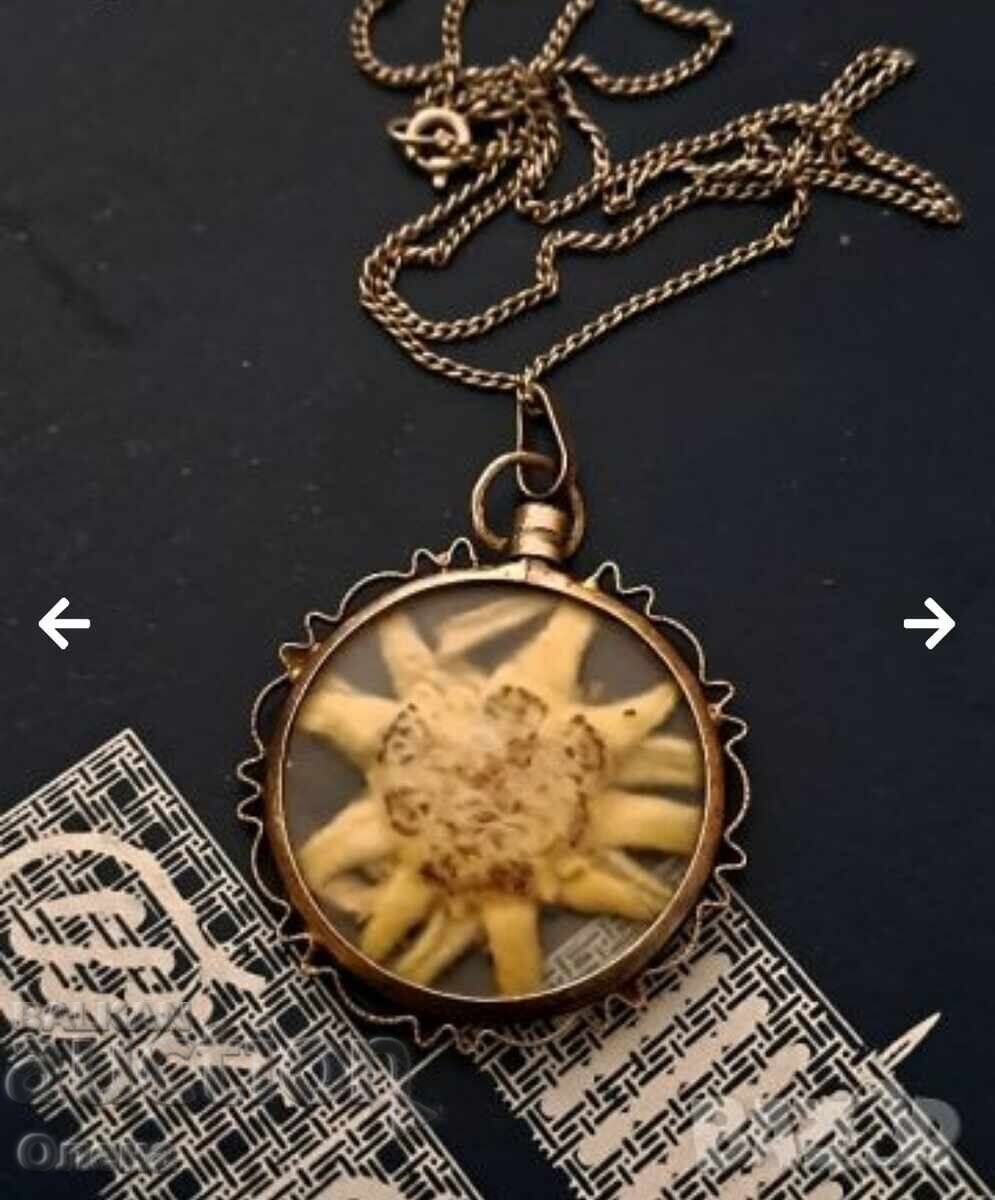 Auction Antique silver pendant with alpine edelweiss Auction Antique silver pendant with alpine edelweiss