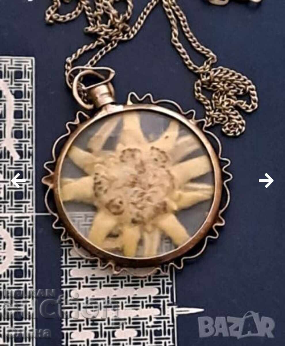 Delivery of Antique silver pendant with alpine edelweiss Delivery of Antique silver pendant with alpine edelweiss