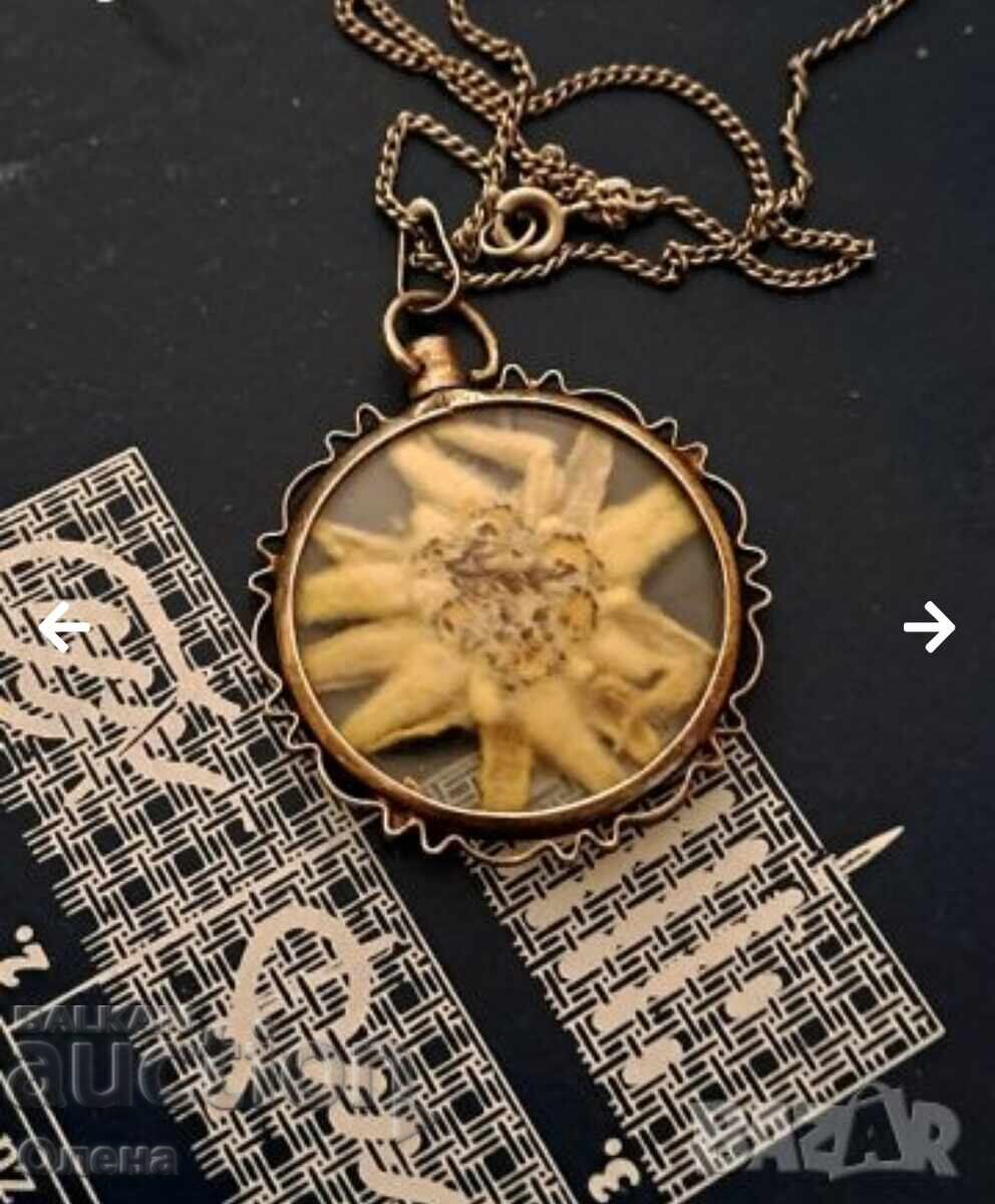 Antique silver pendant with alpine edelweiss Antique silver pendant with alpine edelweiss