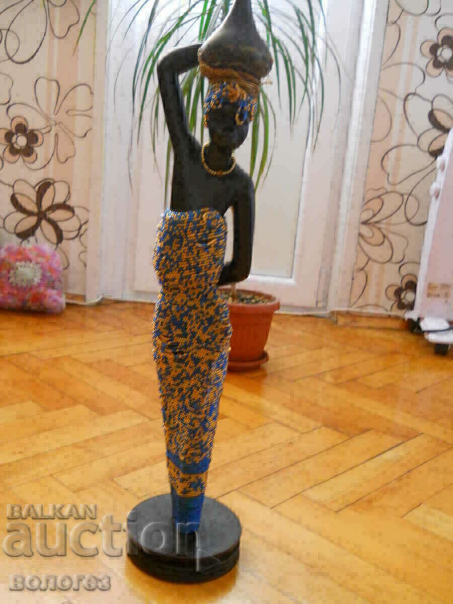 Veche figurină africană din lemn Veche figurină africană din lemn