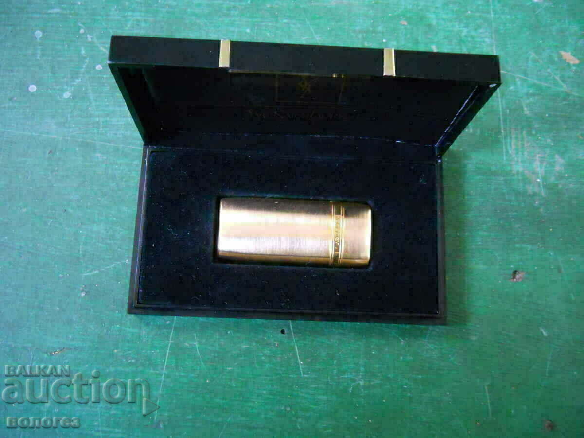 Gas lighter "Yves Sant Laurent" with price 195.00 BGN | € 99.70 Gas lighter "Yves Sant Laurent" with price 195.00 BGN | € 99.70