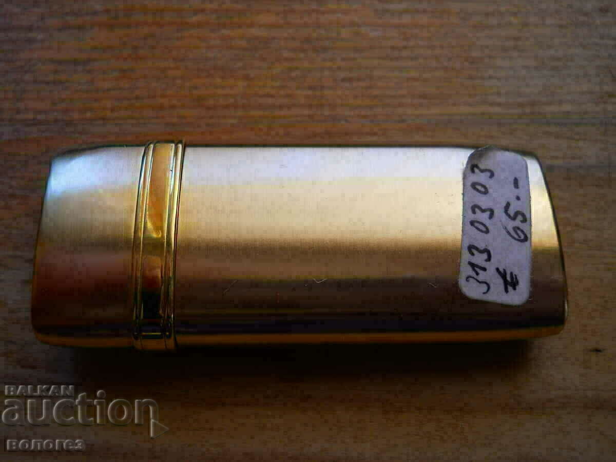 Delivery of Gas lighter "Yves Sant Laurent" Delivery of Gas lighter "Yves Sant Laurent"