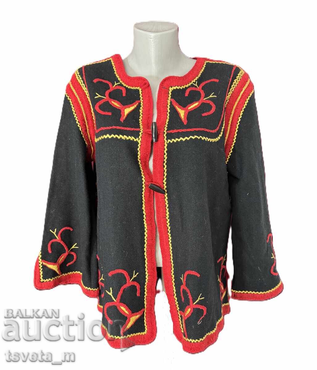 Woolen women's outerwear with hand-embroidered folk costume