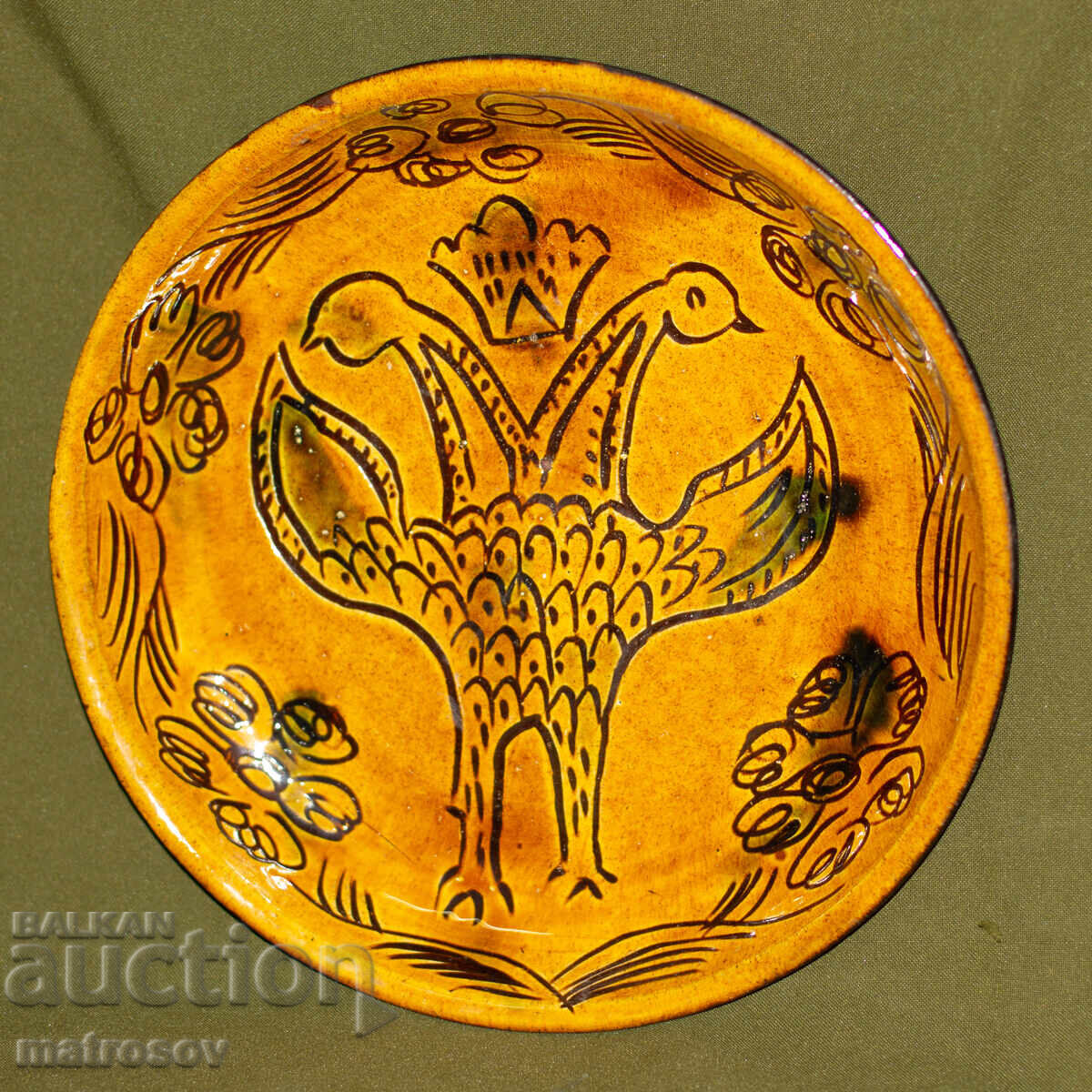 Hand-painted decorative ceramic plate with price 120.00 BGN | € 61.36