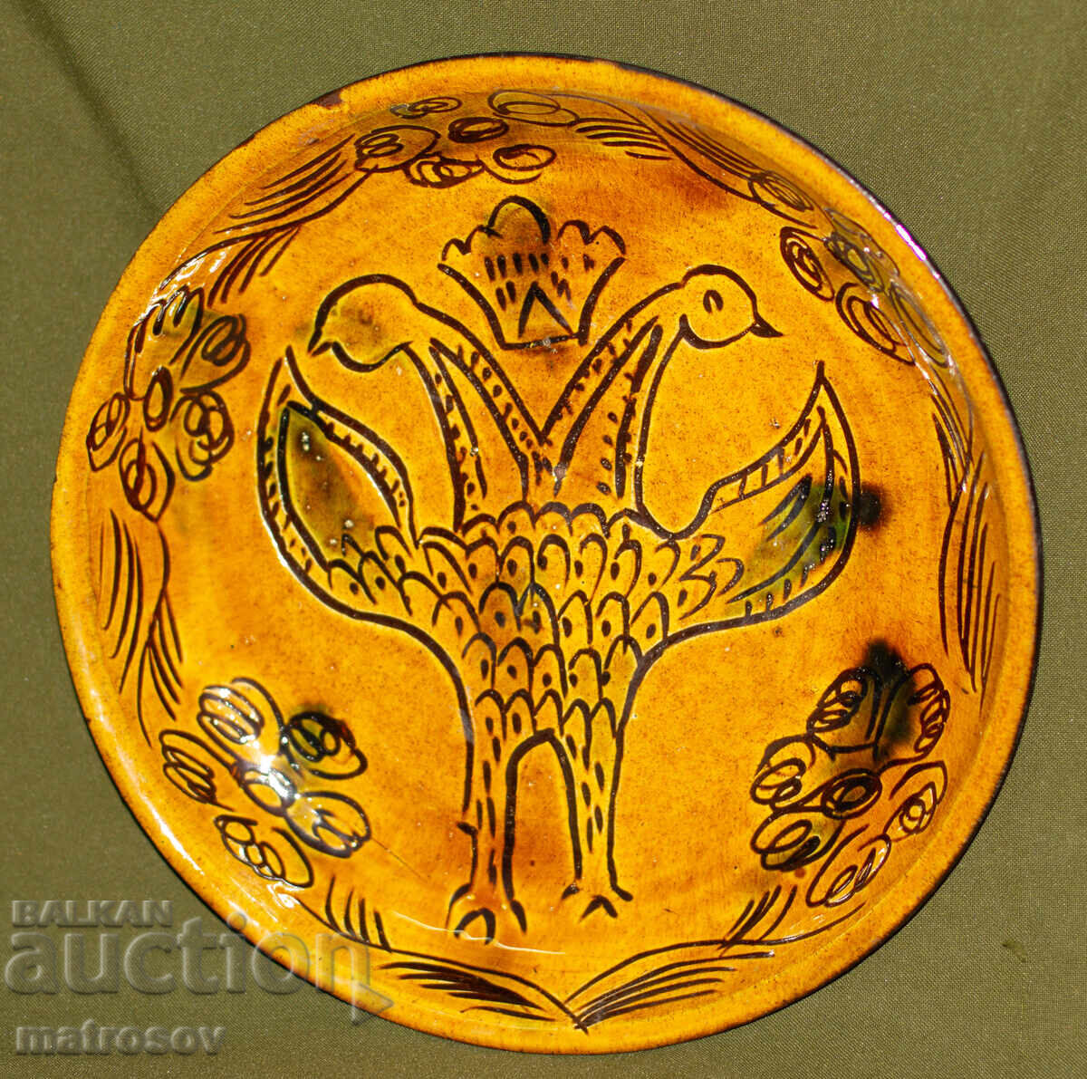 Hand-painted decorative ceramic plate