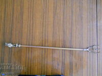 Large brass fork for roasting meat