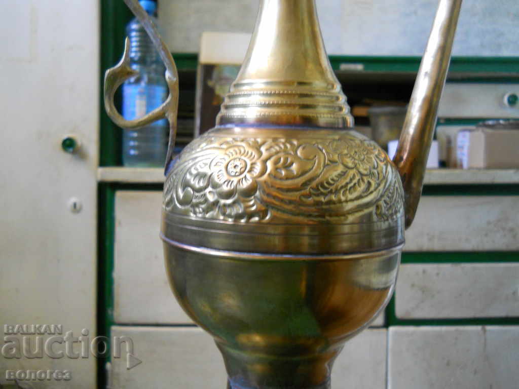 Auction  Large Arabic bronze washing jug