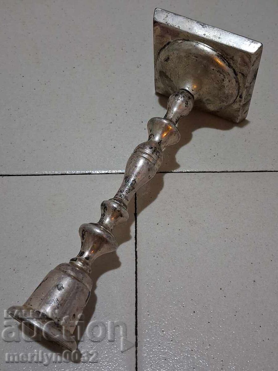 Auction  Old bronze candlestick, thickly silver-plated