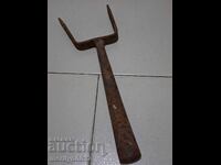 Old hand-forged anvil for hair straightening