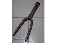 Old hand-forged anvil for hair straightening