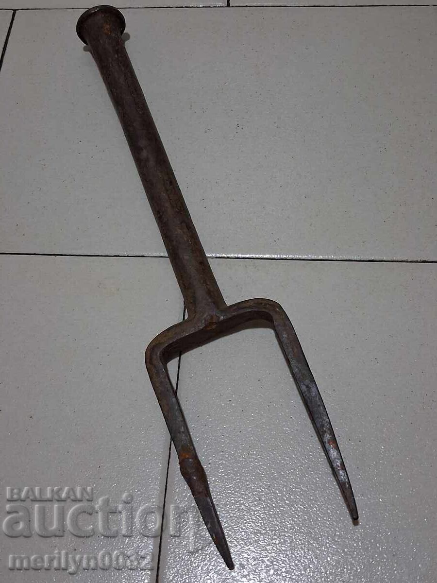 Old hand-forged anvil for hair straightening