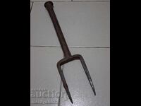 Old hand-forged anvil for hair straightening