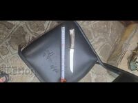 Cuțit lucrat manual