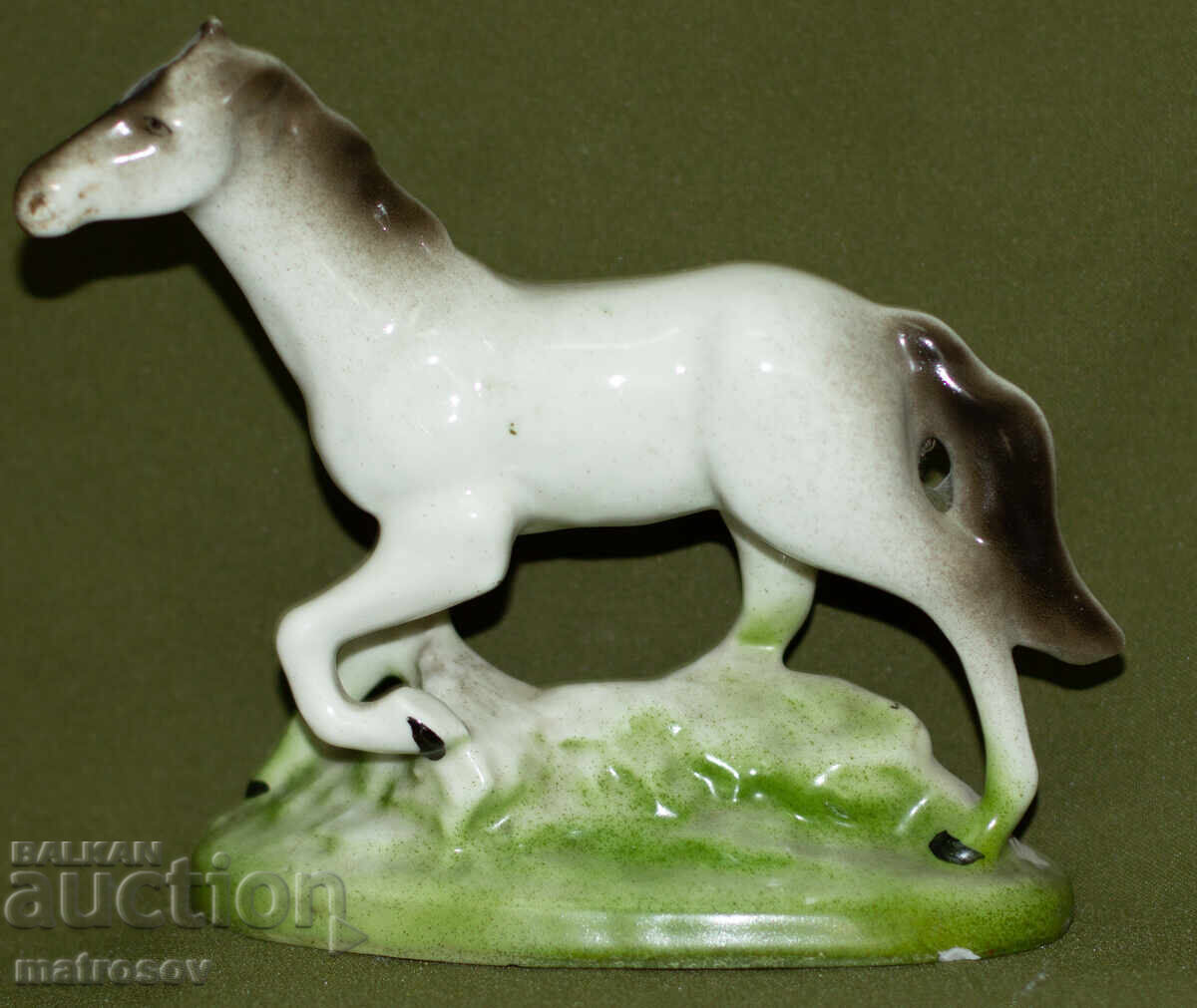 Decorative porcelain figurine of a white stallion with price 120.00 BGN | € 61.36