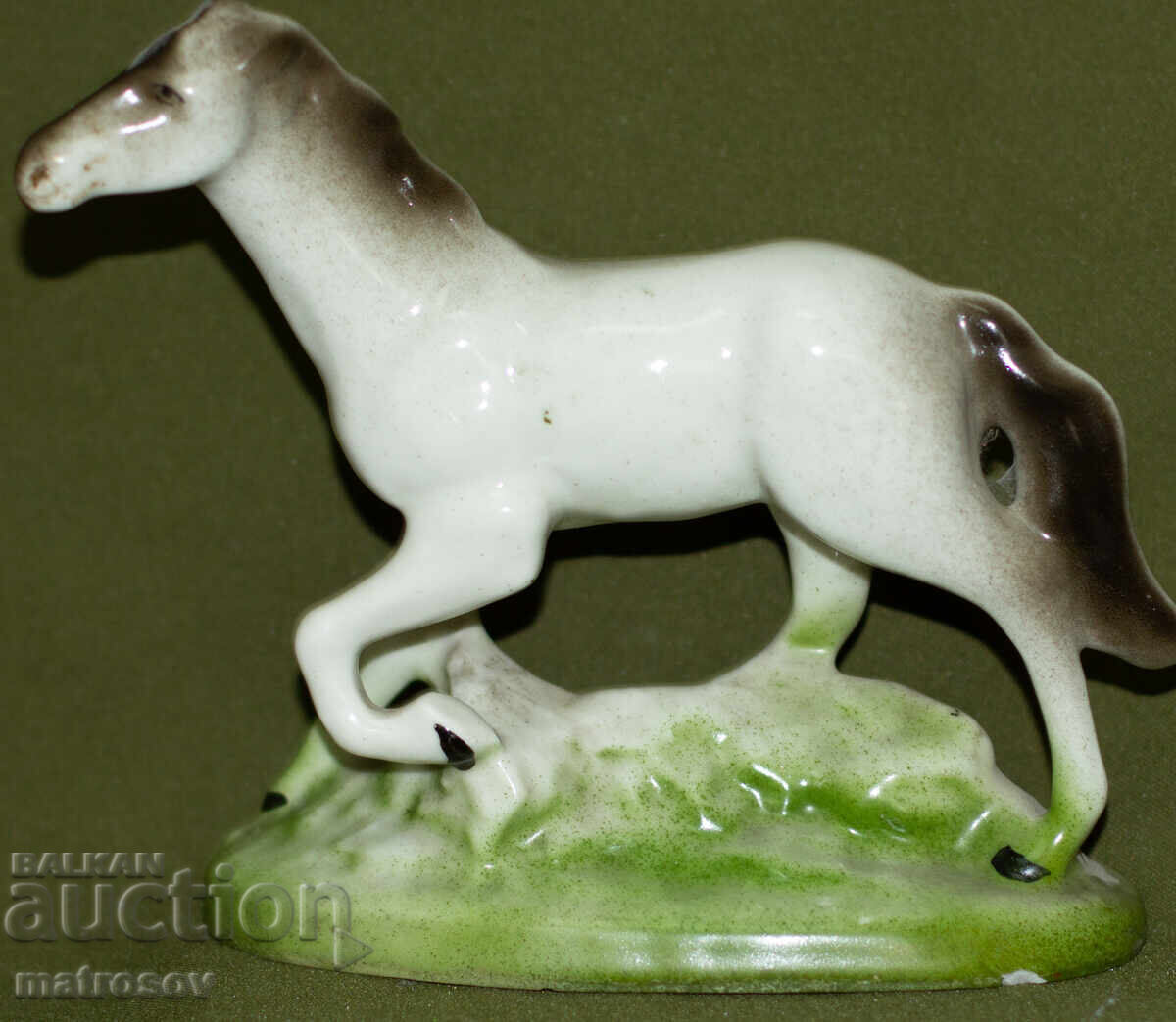 Auction  Decorative porcelain figurine of a white stallion