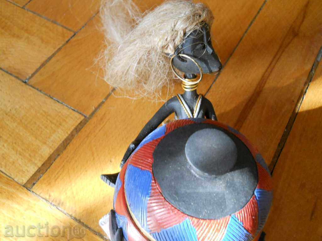 Auction African wooden box with female figures Auction African wooden box with female figures