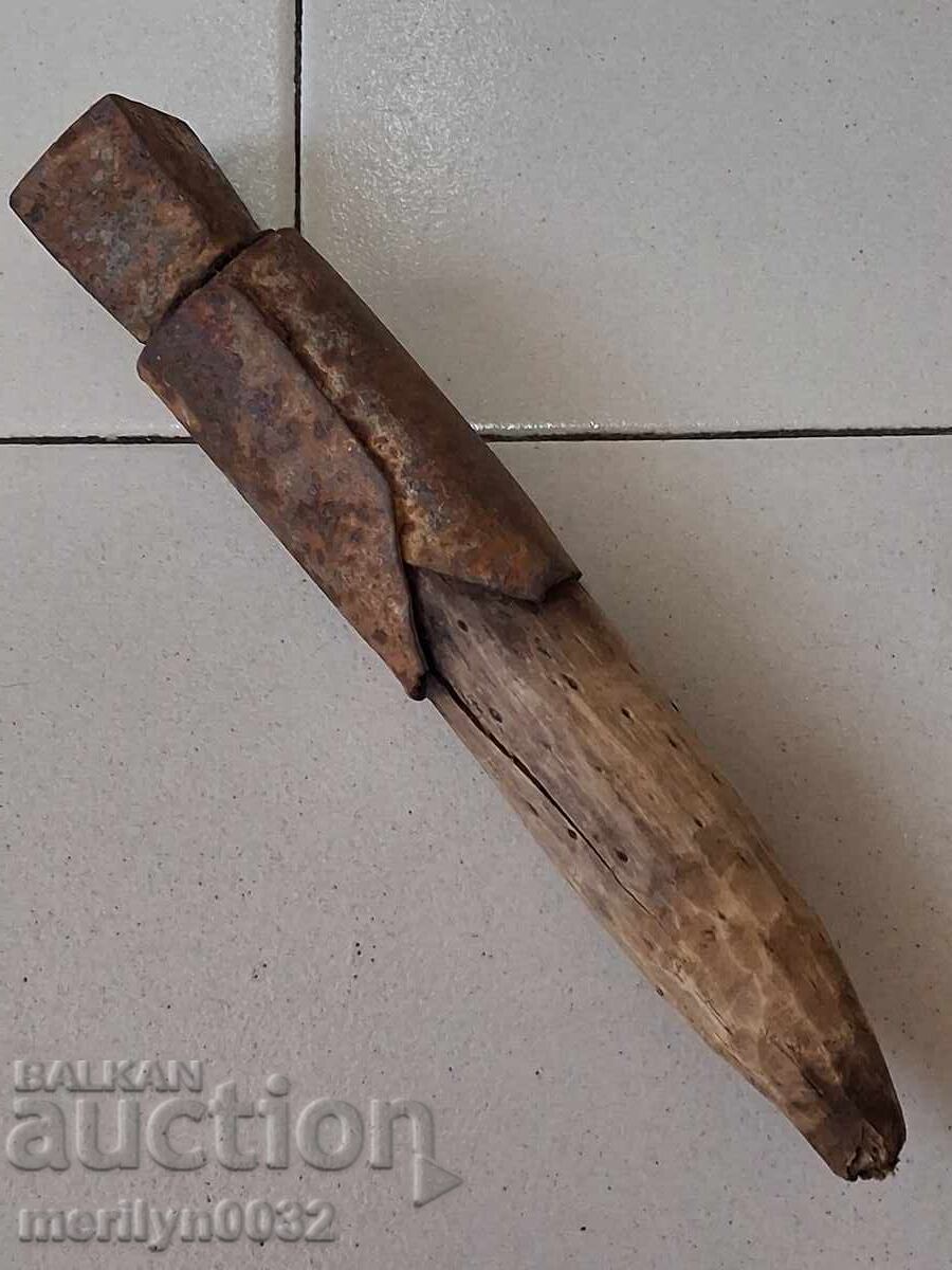 Old hand-forged anvil for hair straightening