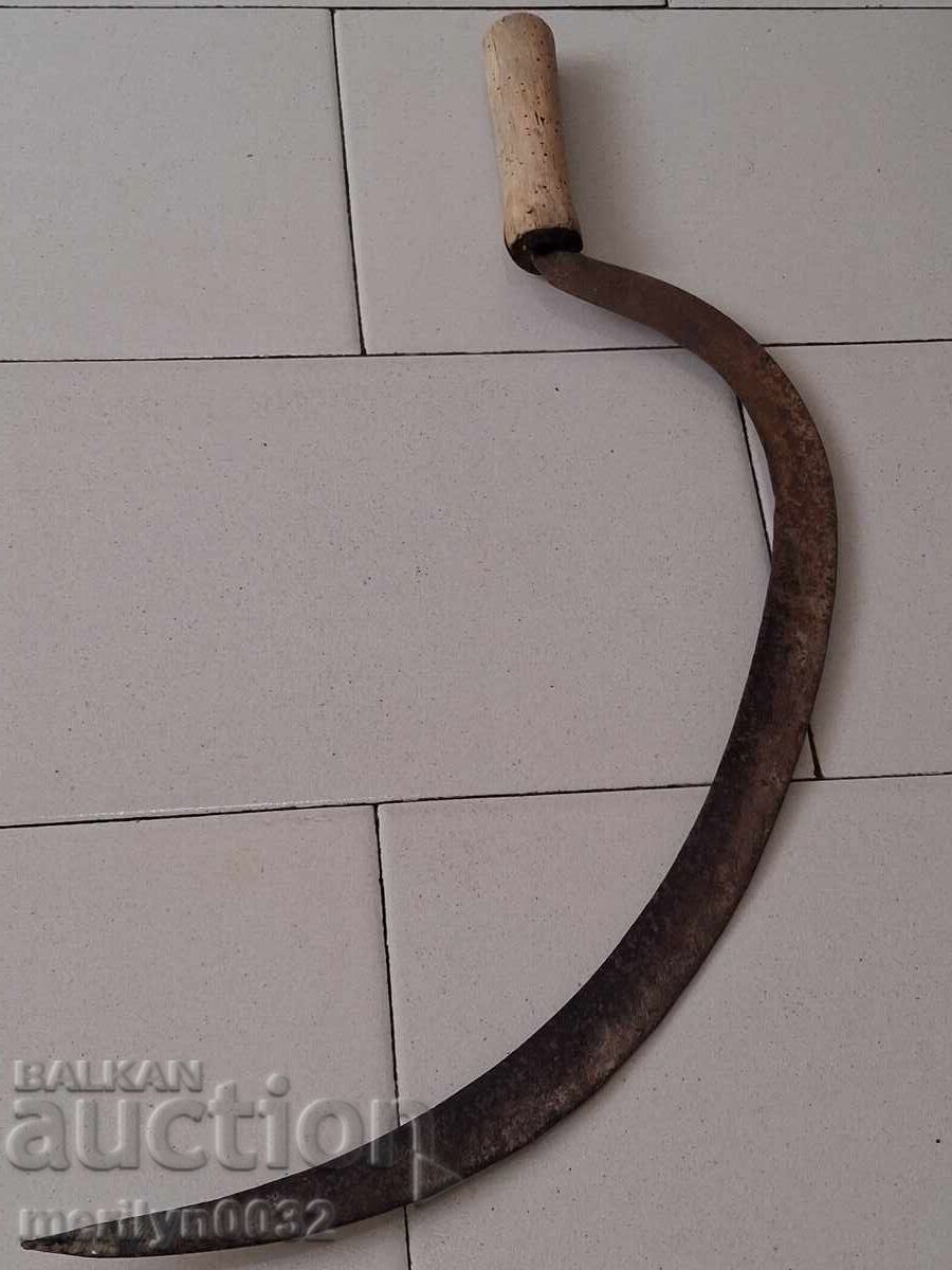 Old scythe, sickle, blade, wrought iron